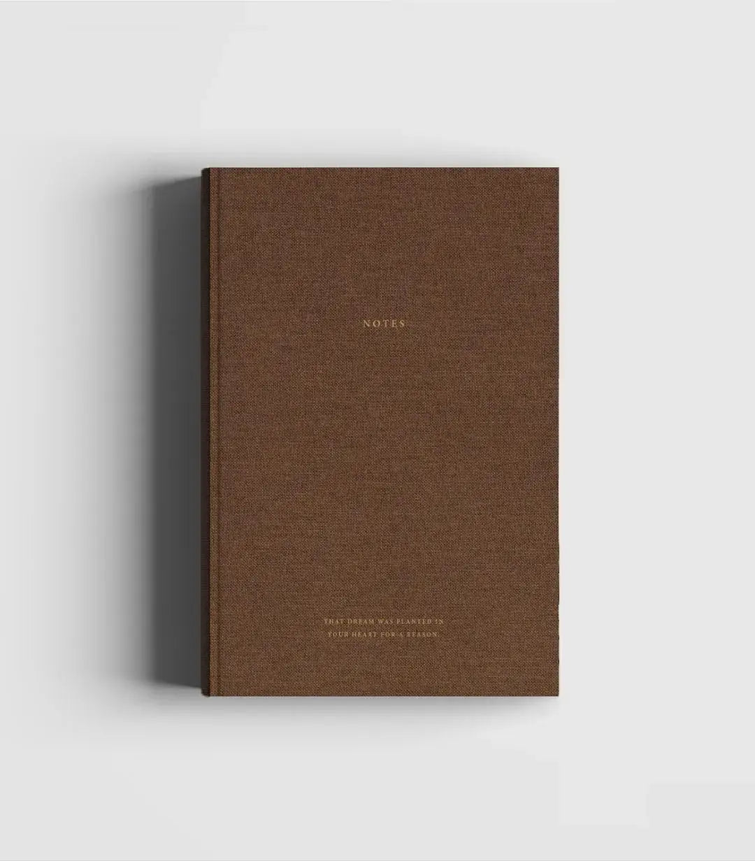 Notizbuch aus braunem Leinen und Gold