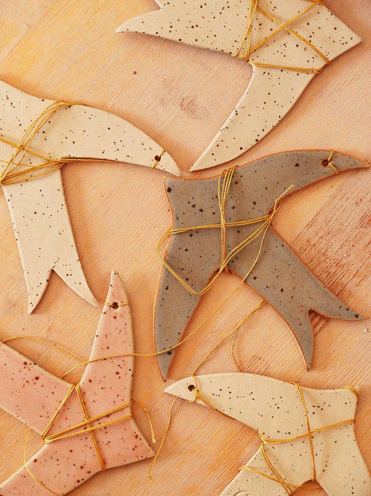 Keramische Schwalben